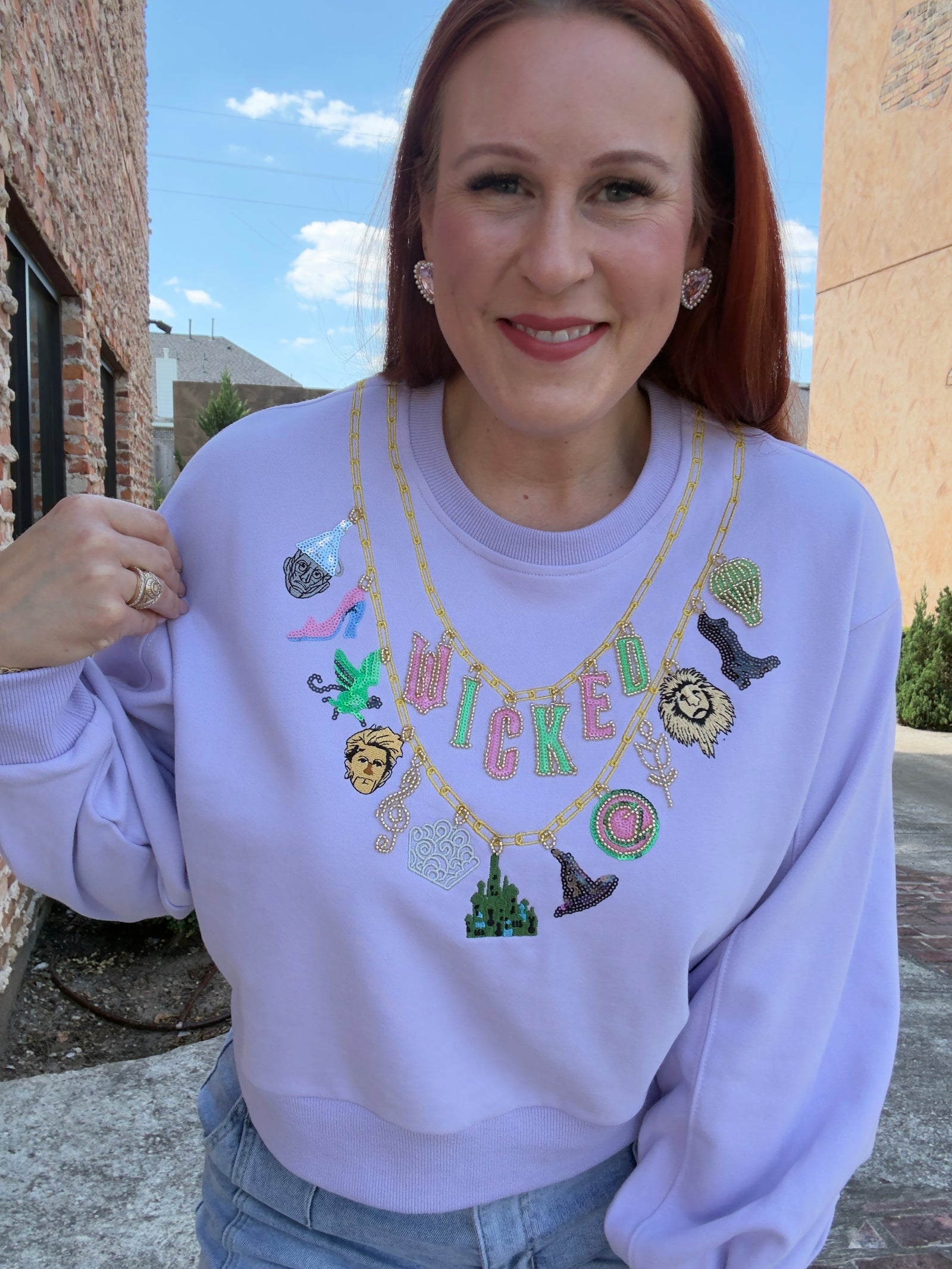 Queen of Sparkles Licensed Lavender Wicked Charm Necklace Sweatshirt